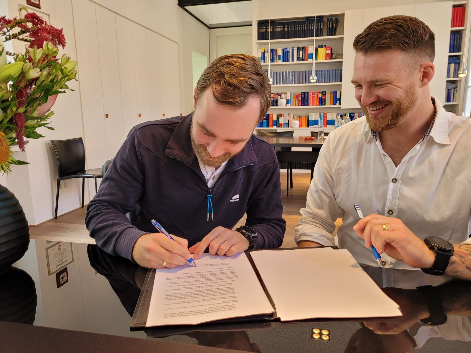 Malte Rudolf and Julian Werner at the notary