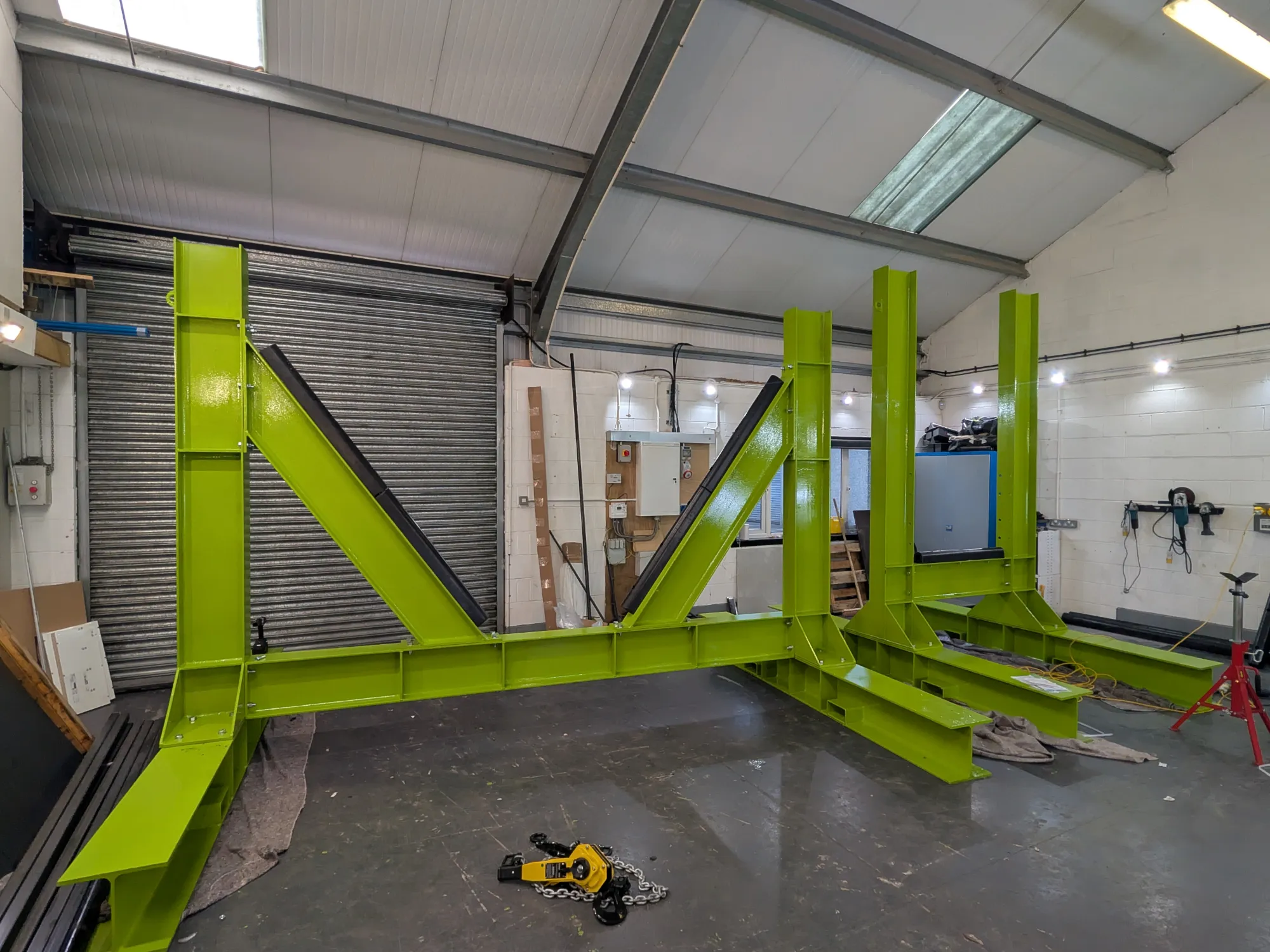 Fabricating custom stands to support turbine blades during maintenance and blade changes.