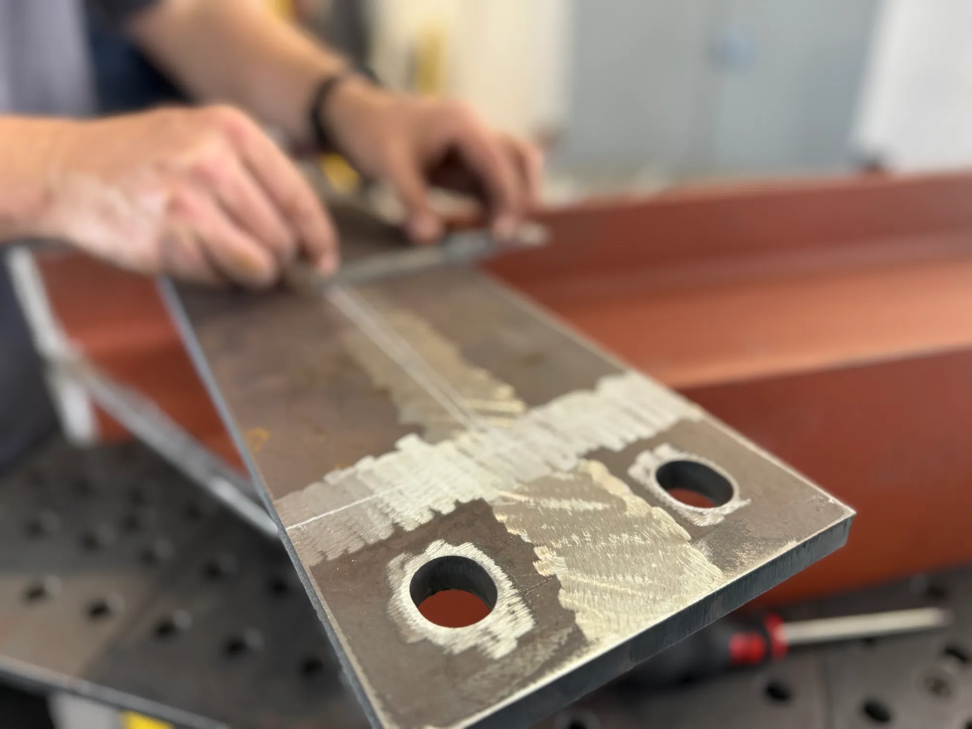 Fabricating custom stands to support turbine blades during maintenance and blade changes.