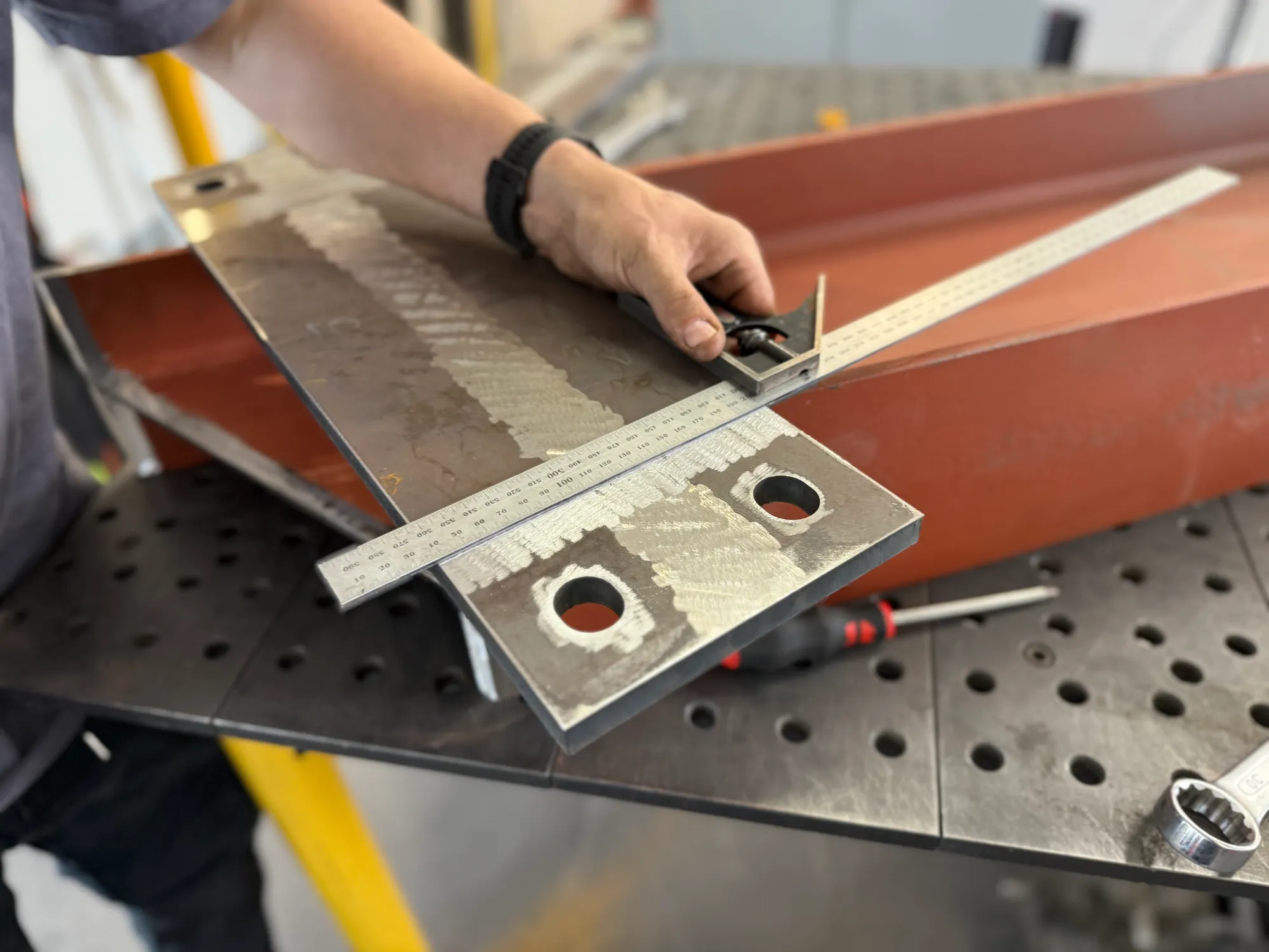 Fabricating custom stands to support turbine blades during maintenance and blade changes.