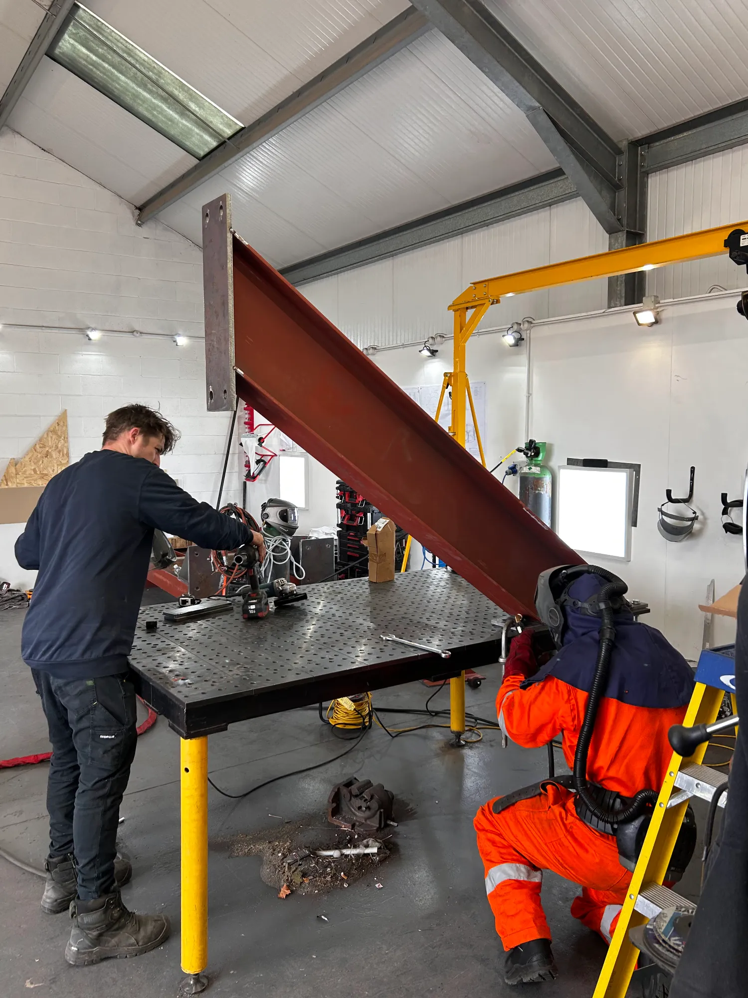 Fabricating custom stands to support turbine blades during maintenance and blade changes.