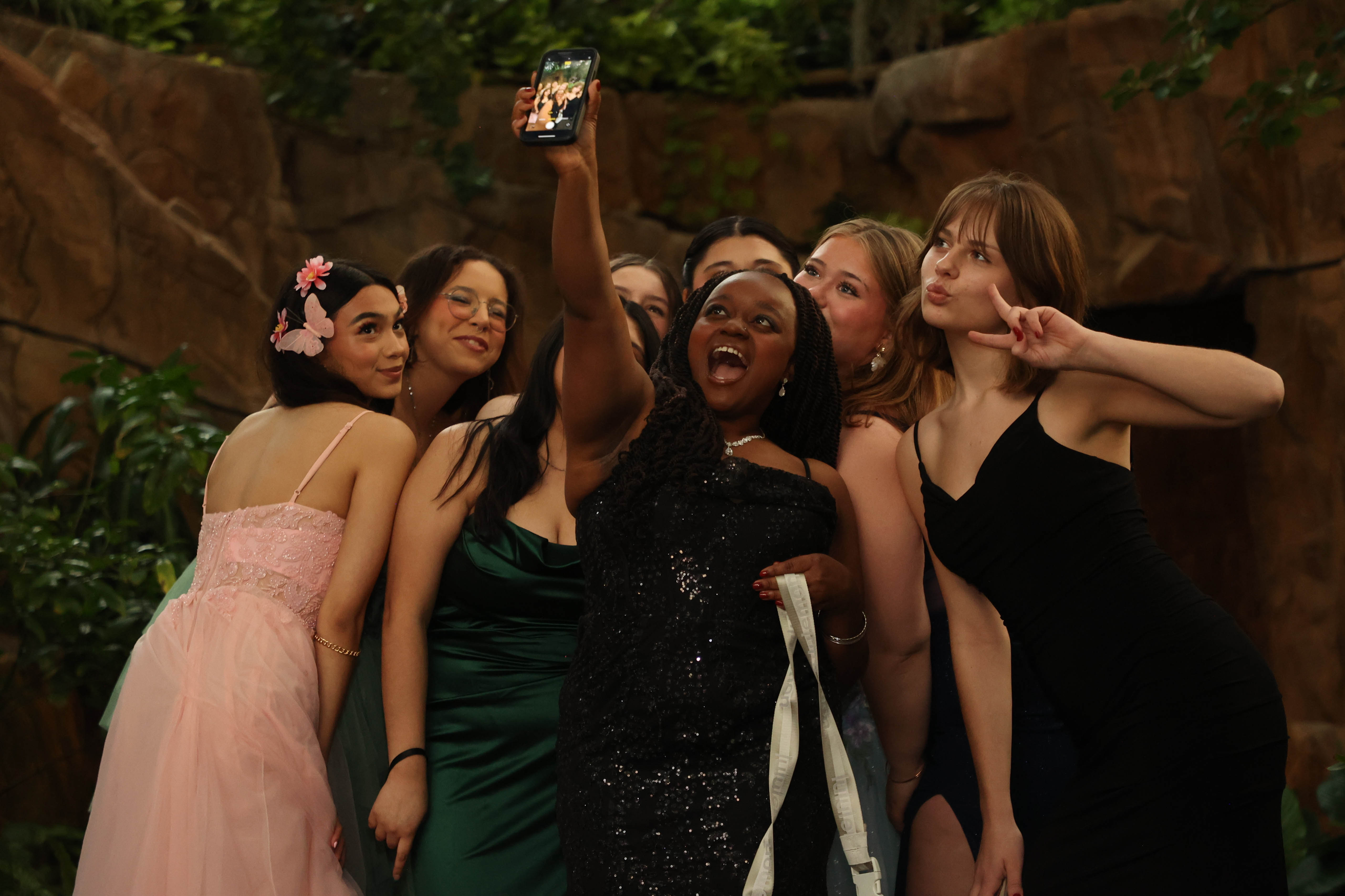 Students pose for a photo at the school dance.