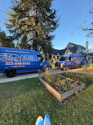 ProView Plumbing & Rooter vans parked outside a home providing thermostat services in Pasadena CA.