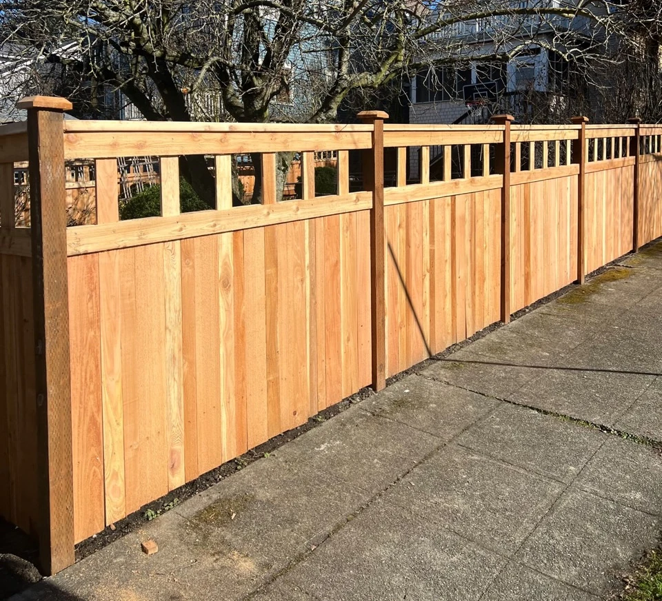 new cedar fence with decorative lattice openings