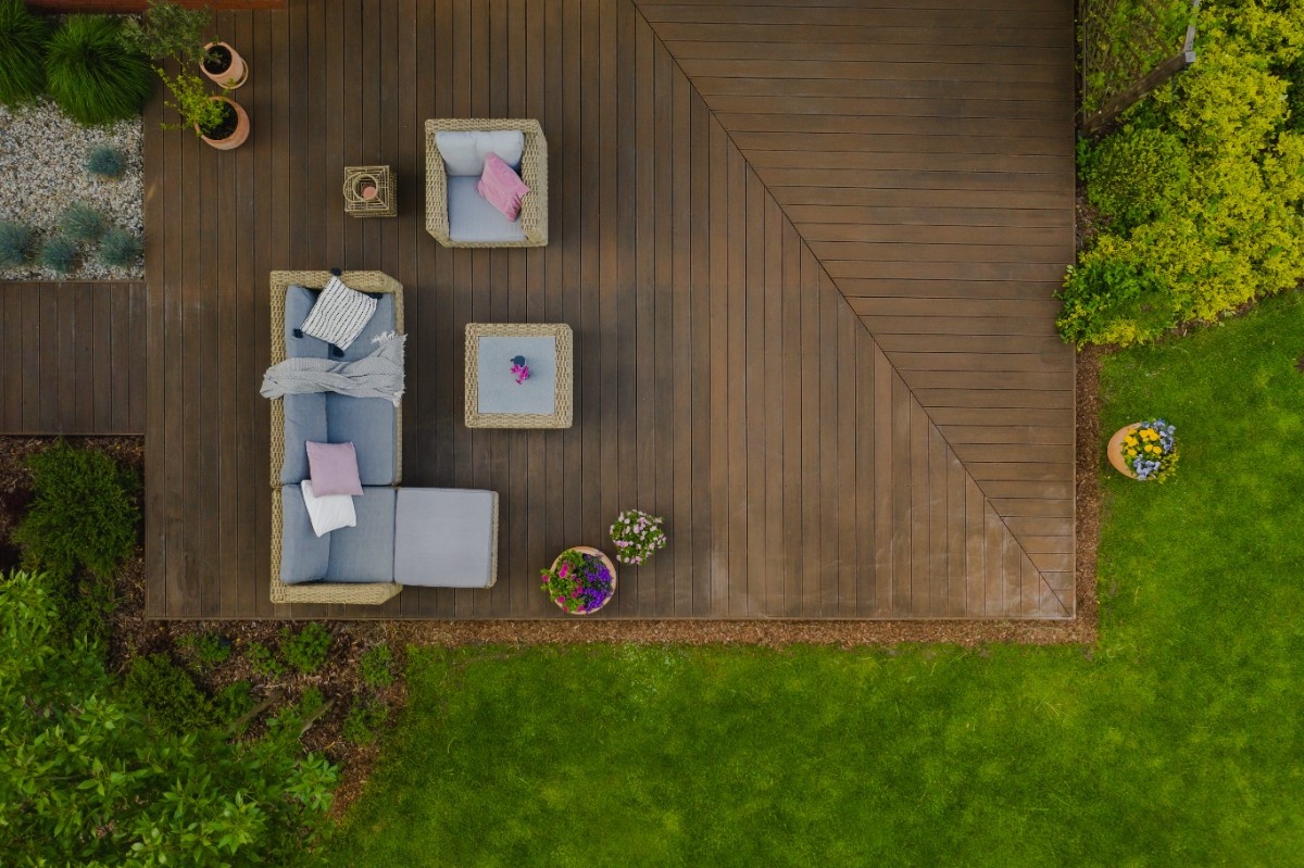 A top view of a wooden deck in Seattle with lounge area