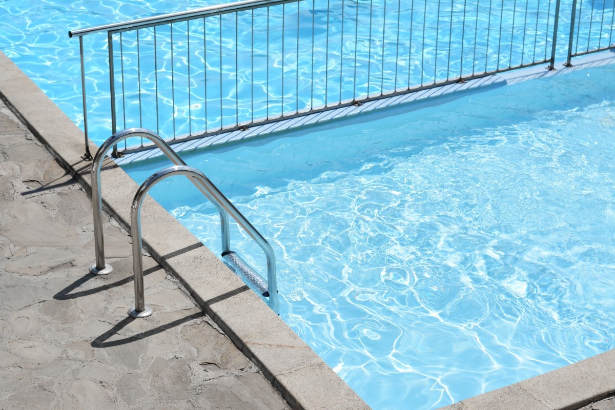 An aluminum fence dividing swimming areas in Seattle