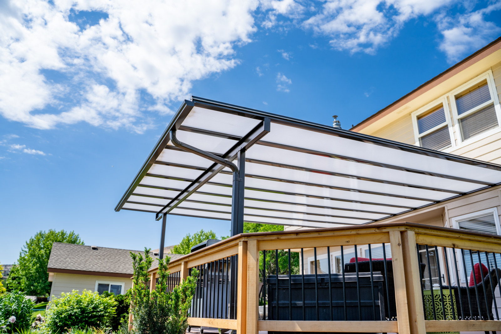 Covered patio lounge on a deck at a Greater Seattle home
