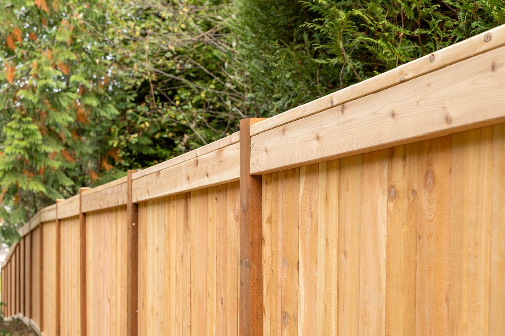 Newly installed 6-foot cedar privacy fence along a Greater Seattle backyard