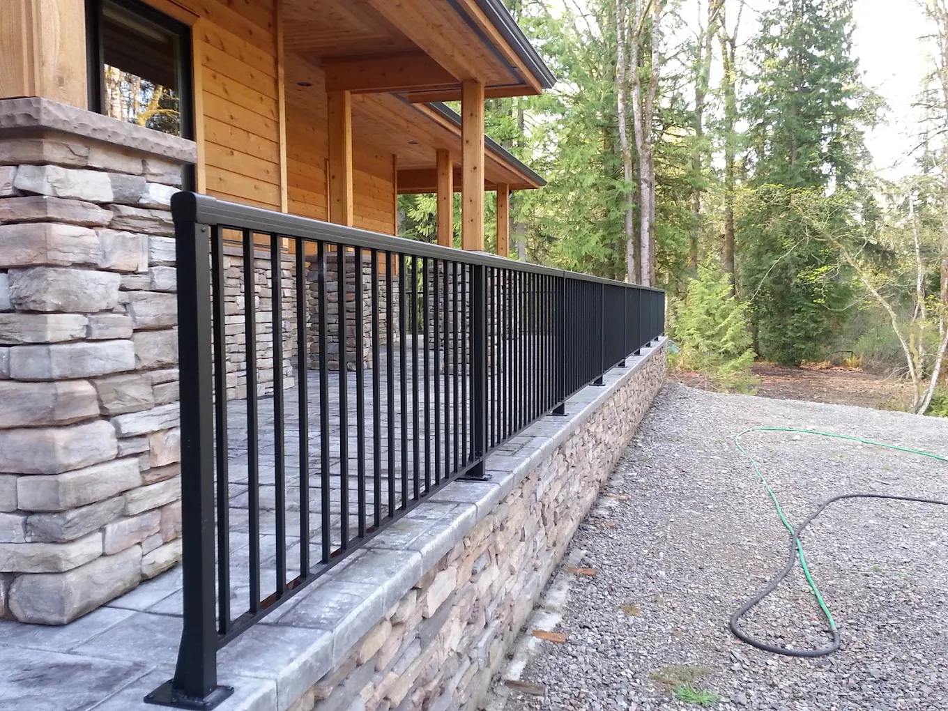 Black aluminum fencing built on a veranda of a remote Seattle home 