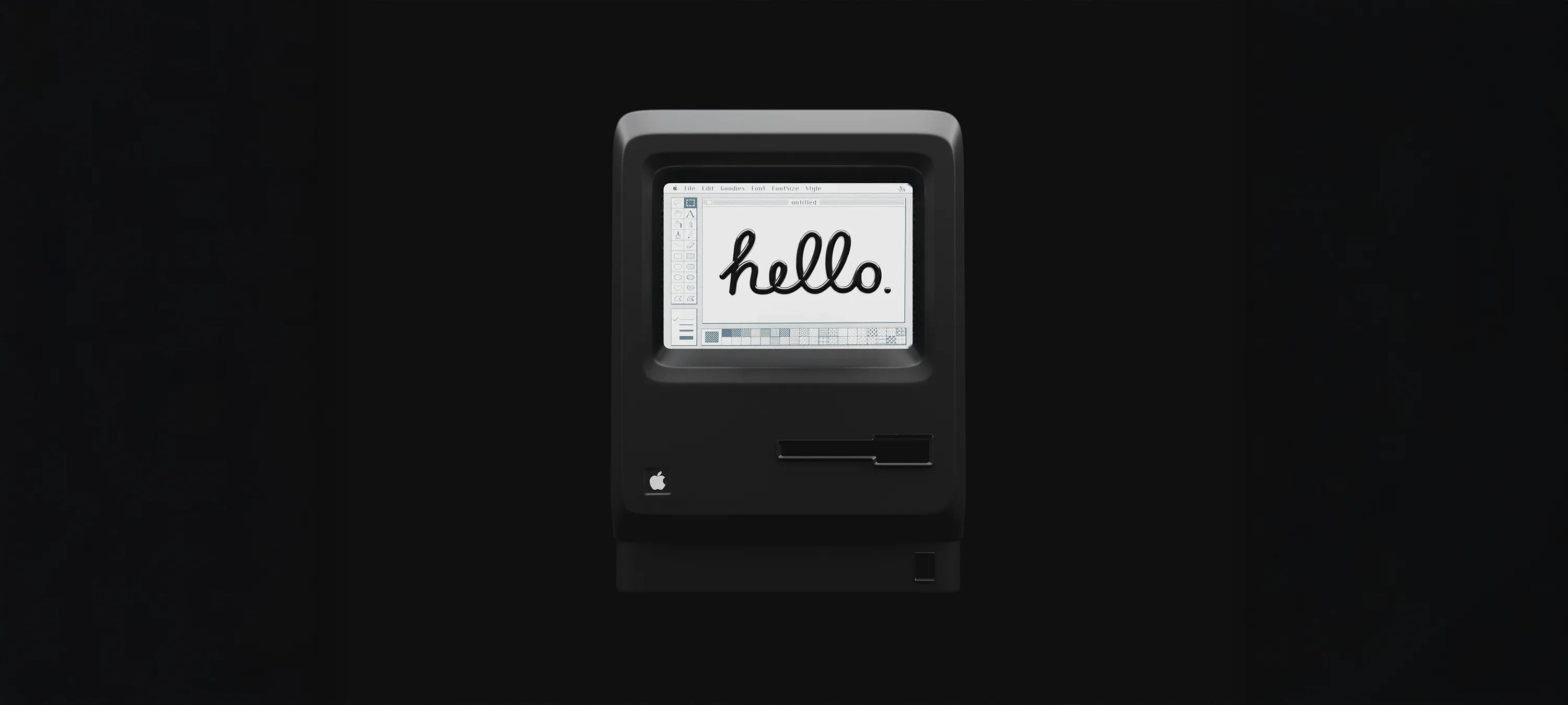 Vintage Macintosh-computer met het woord 'hello' in een handgeschreven cursief lettertype op het scherm, als voorbeeld van speelse typografie in logo-design