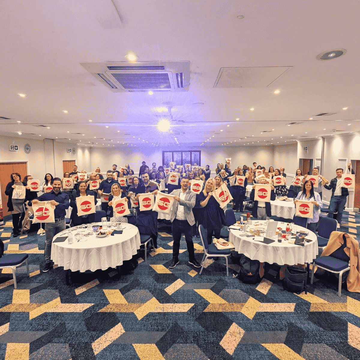 Scoffs East Roadshow Attendees pose with their Roadshow Goodie Bags