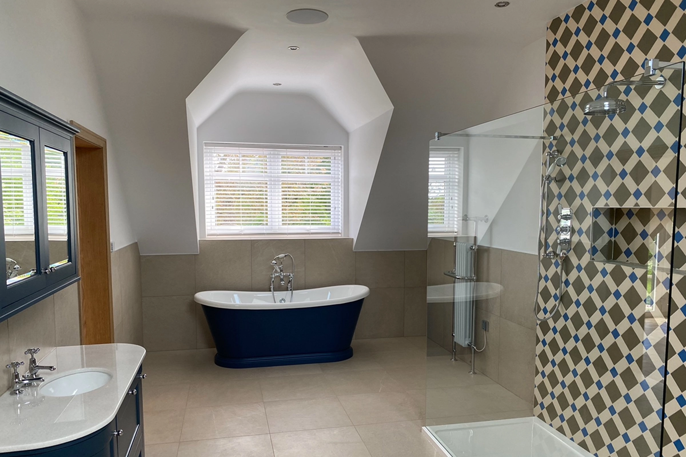 Luxury bathroom with Sonance in-ceiling speakers