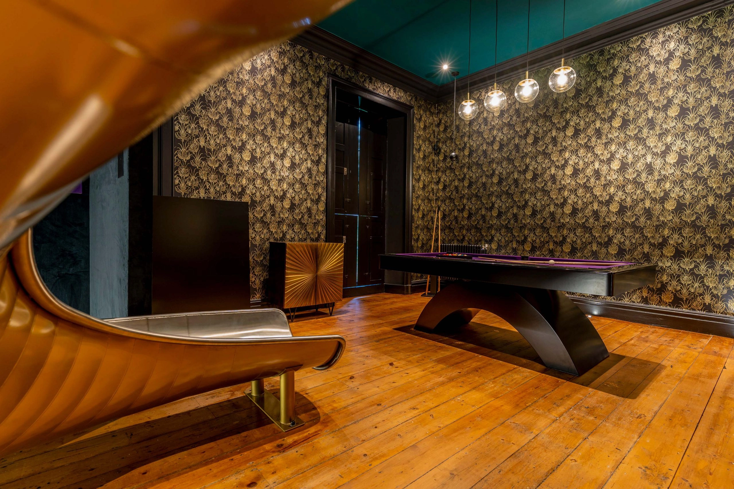 Entertainment room with slide, with Control 4 and Gallo Acoustics speakers