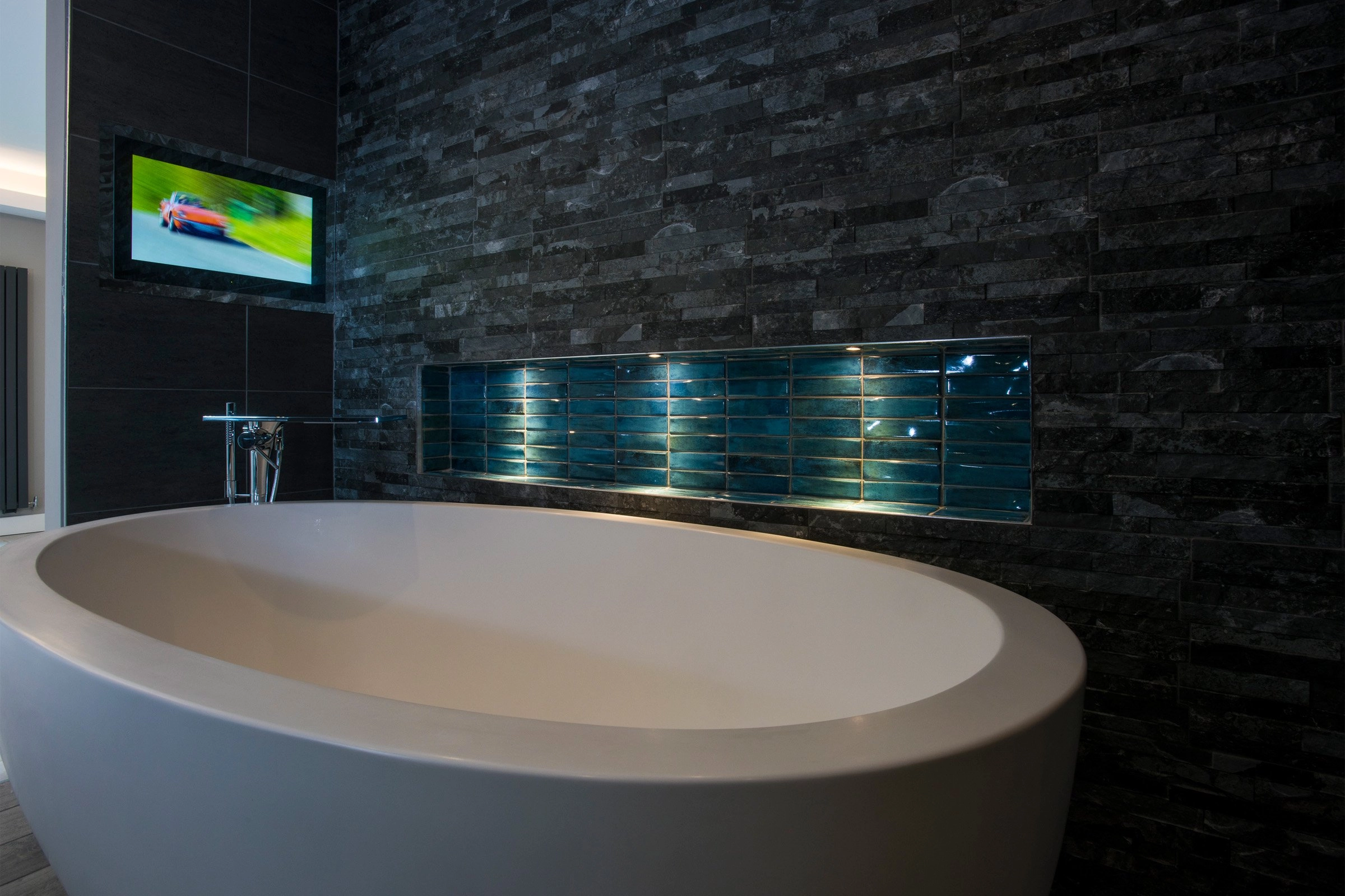 Luxury bathroom featuring bathroom TV