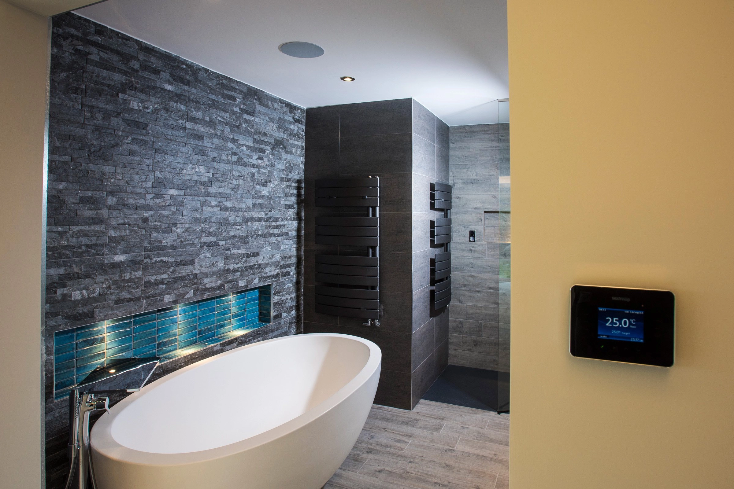 Luxury bathroom with Sonance in-ceiling speakers