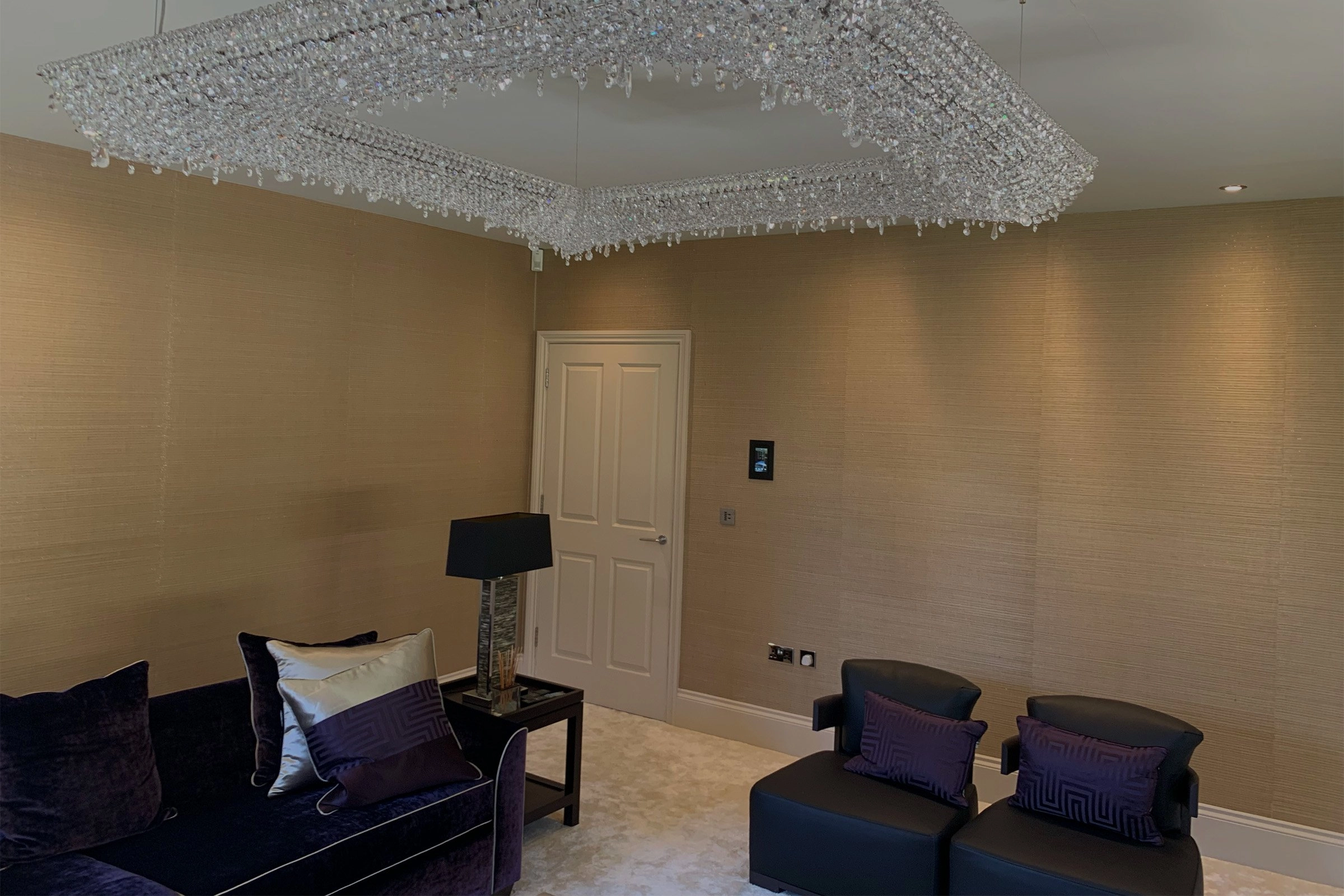 Formal living room with Lutron lighting and Savant control