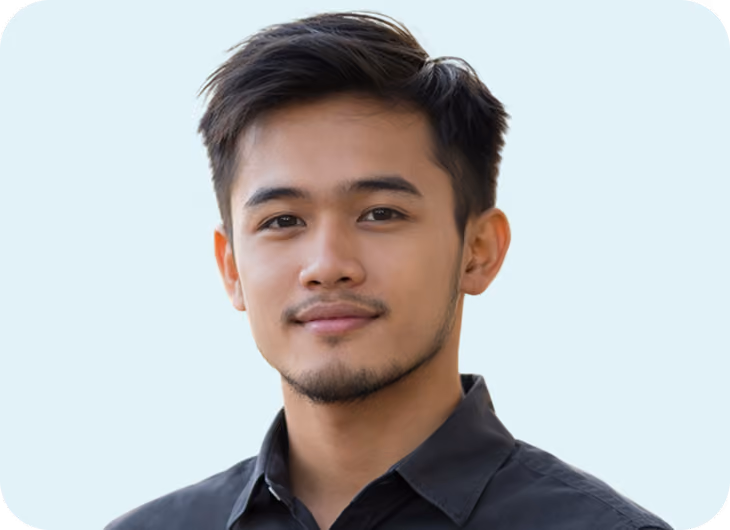 Headshot of Pryce, a smiling GrowthAssistant video editor.