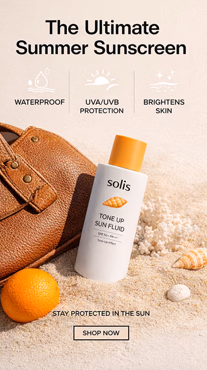 Sunscreen bottle on sand with shells in a summer skincare Meta ad.