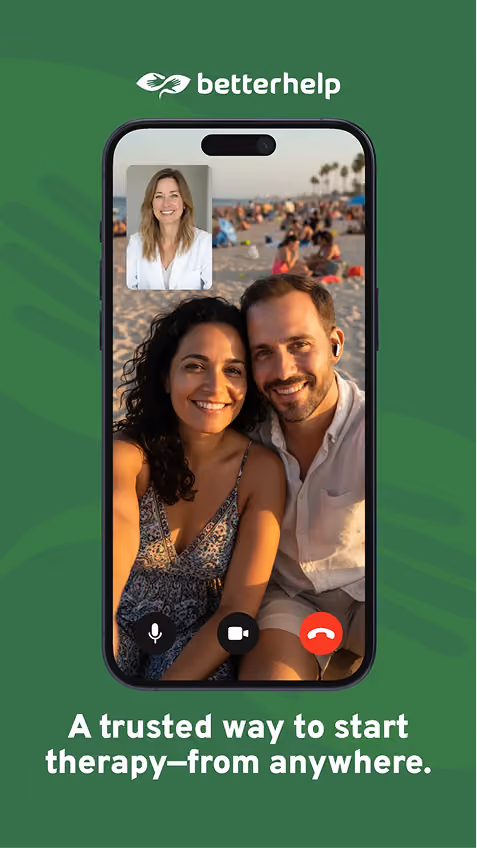 Couple on a video therapy call from the beach in a BetterHelp ad.