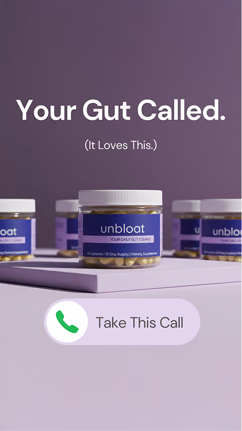 Row of Unbloat supplement jars on a purple pedestal.