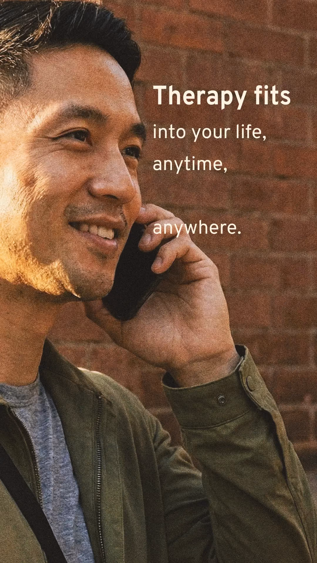 Man smiling on the phone in a therapy Story ad design.