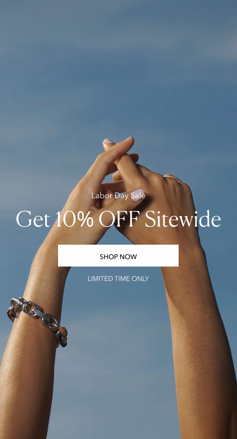 Woman raising her arms against the sky in a Labor Day sale banner ad.