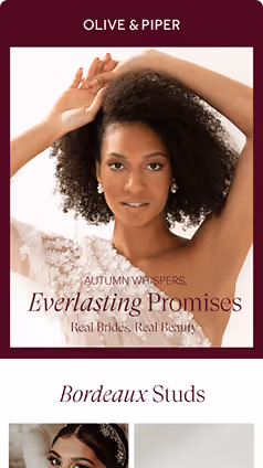 Woman with curly hair wearing pearl earrings in a bridal jewelry email.