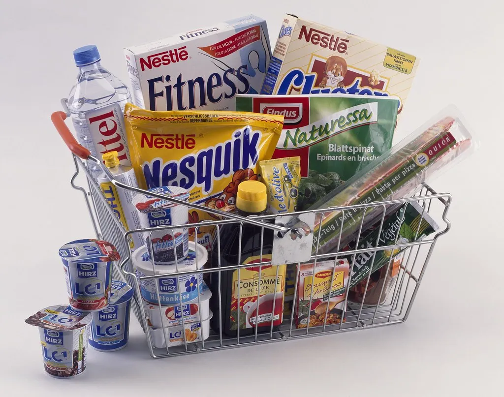 Nestlé products in a shopping basket, illustrating the breadth of its brand portfolio.