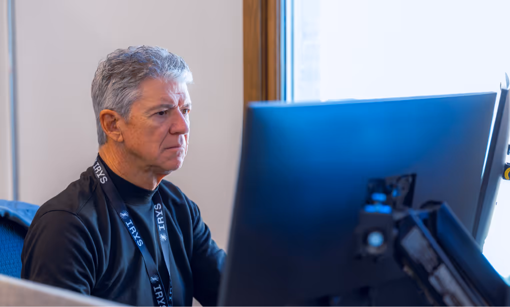 Irys employee working on computer