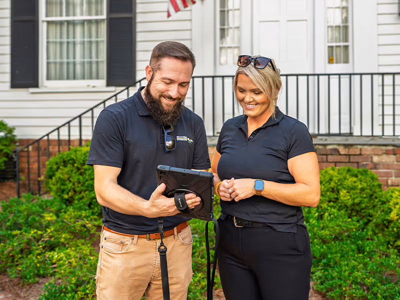 pest pro with homeowner