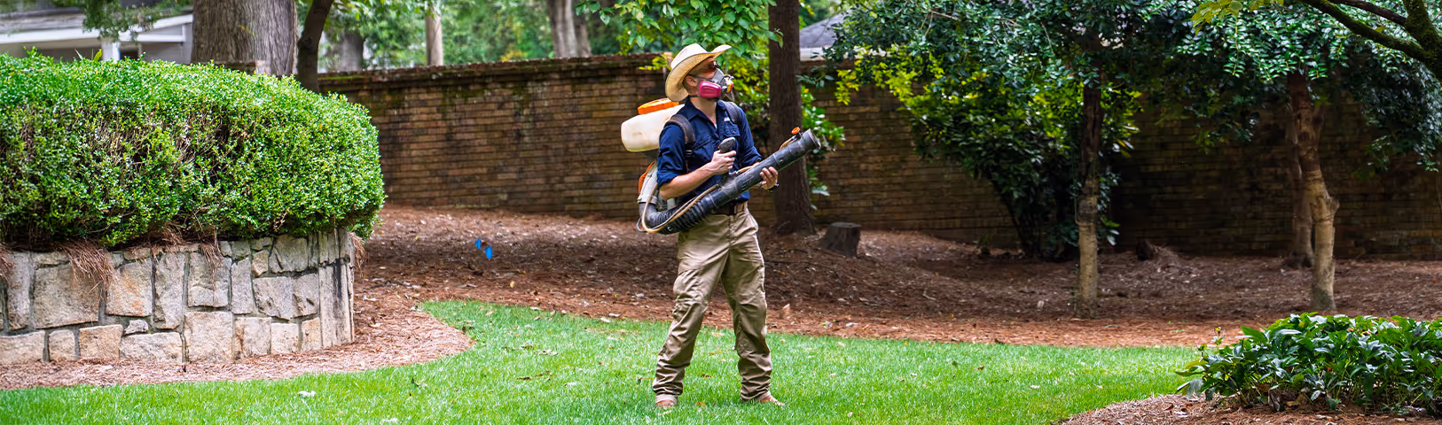 tech spraying for mosquitoes in oxford yard