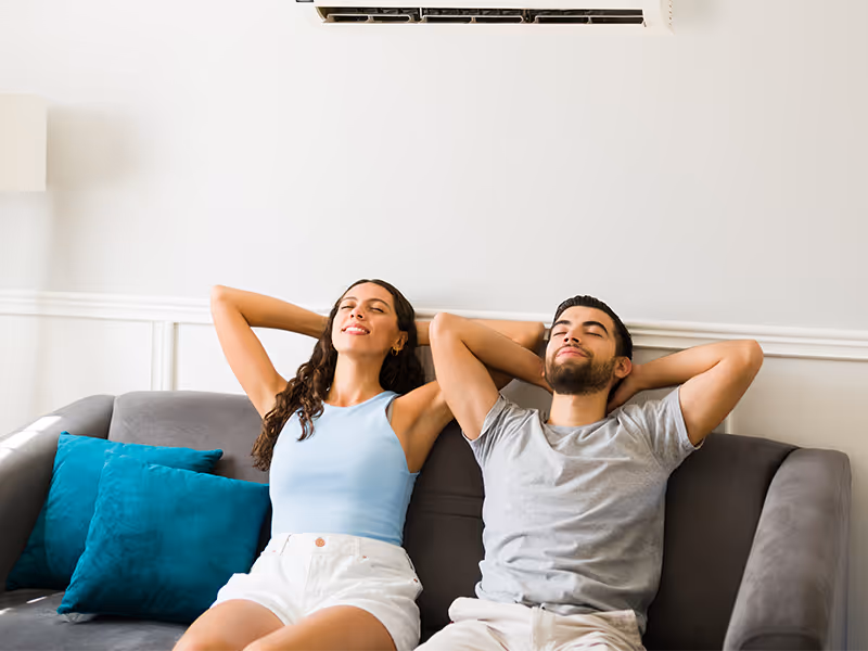 couple relaxing on couch