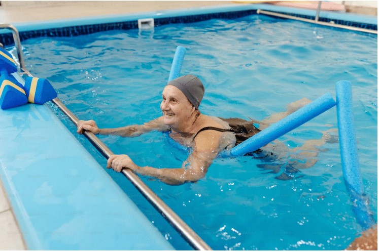 woman doing water aerobics