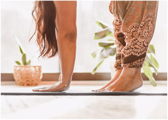 woman doing yoga stretches