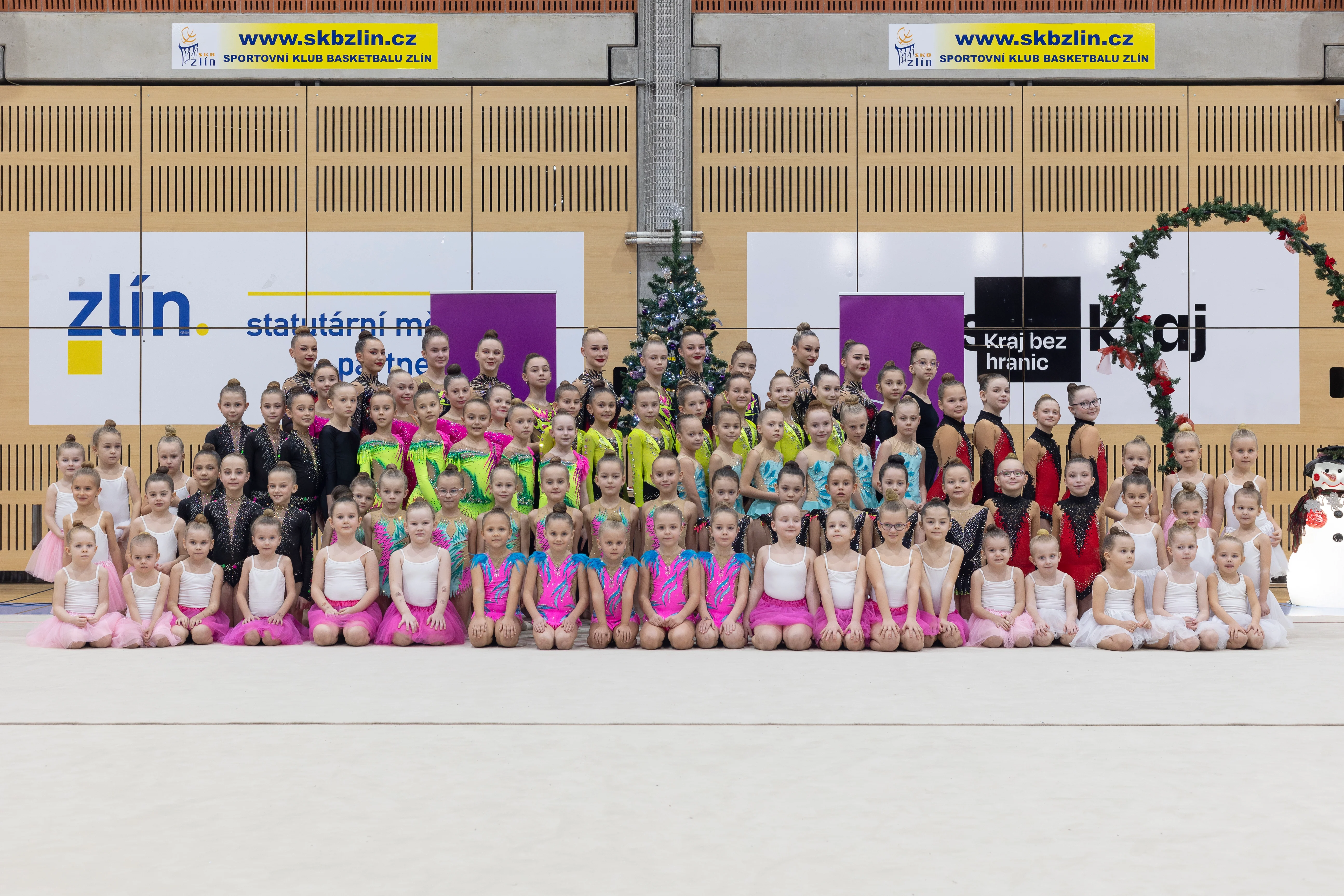 a large group of rhythmic gymnasts