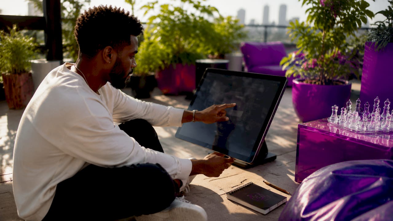 Designer interacting with DAM dashboard
