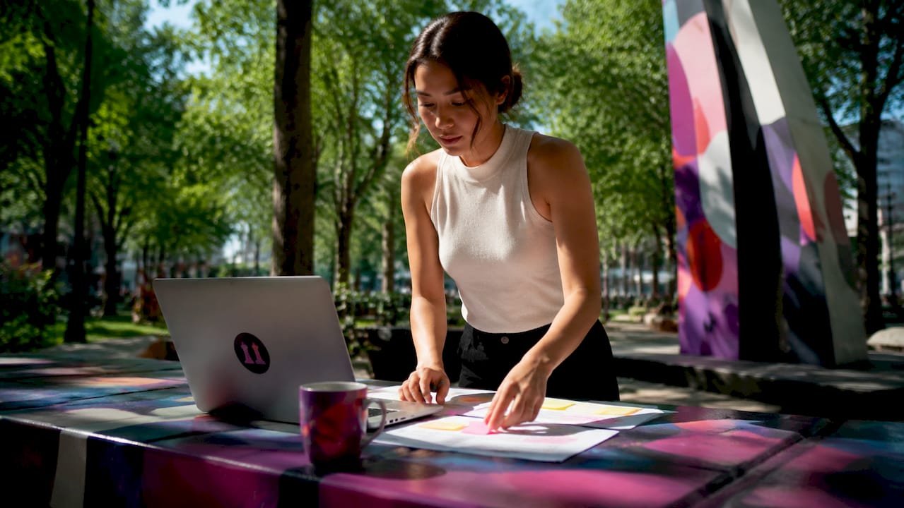 Founder planning startup brand voice at café