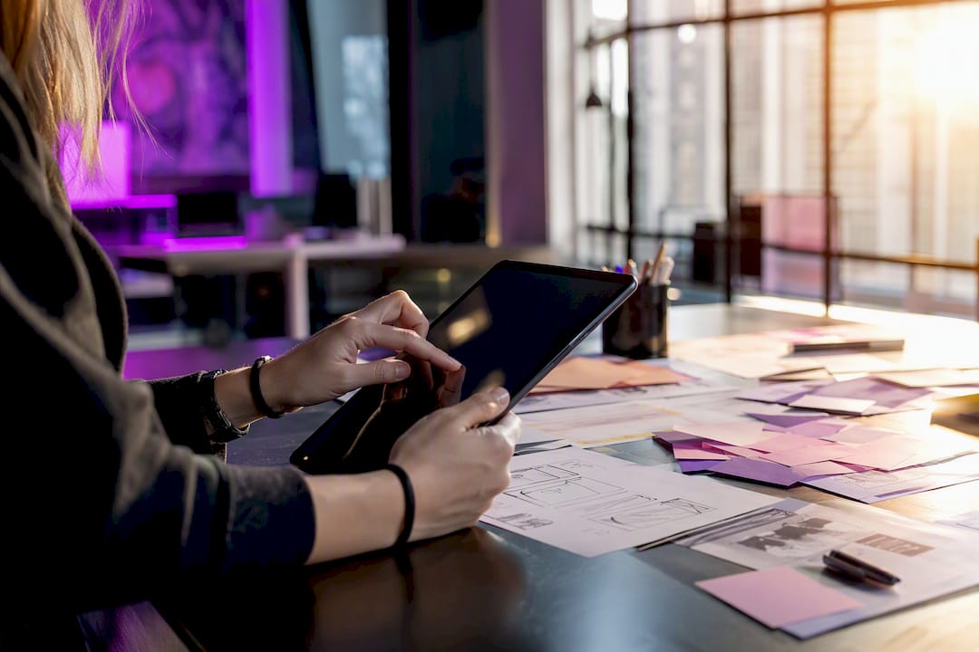 Hands testing cookie consent banner on tablet