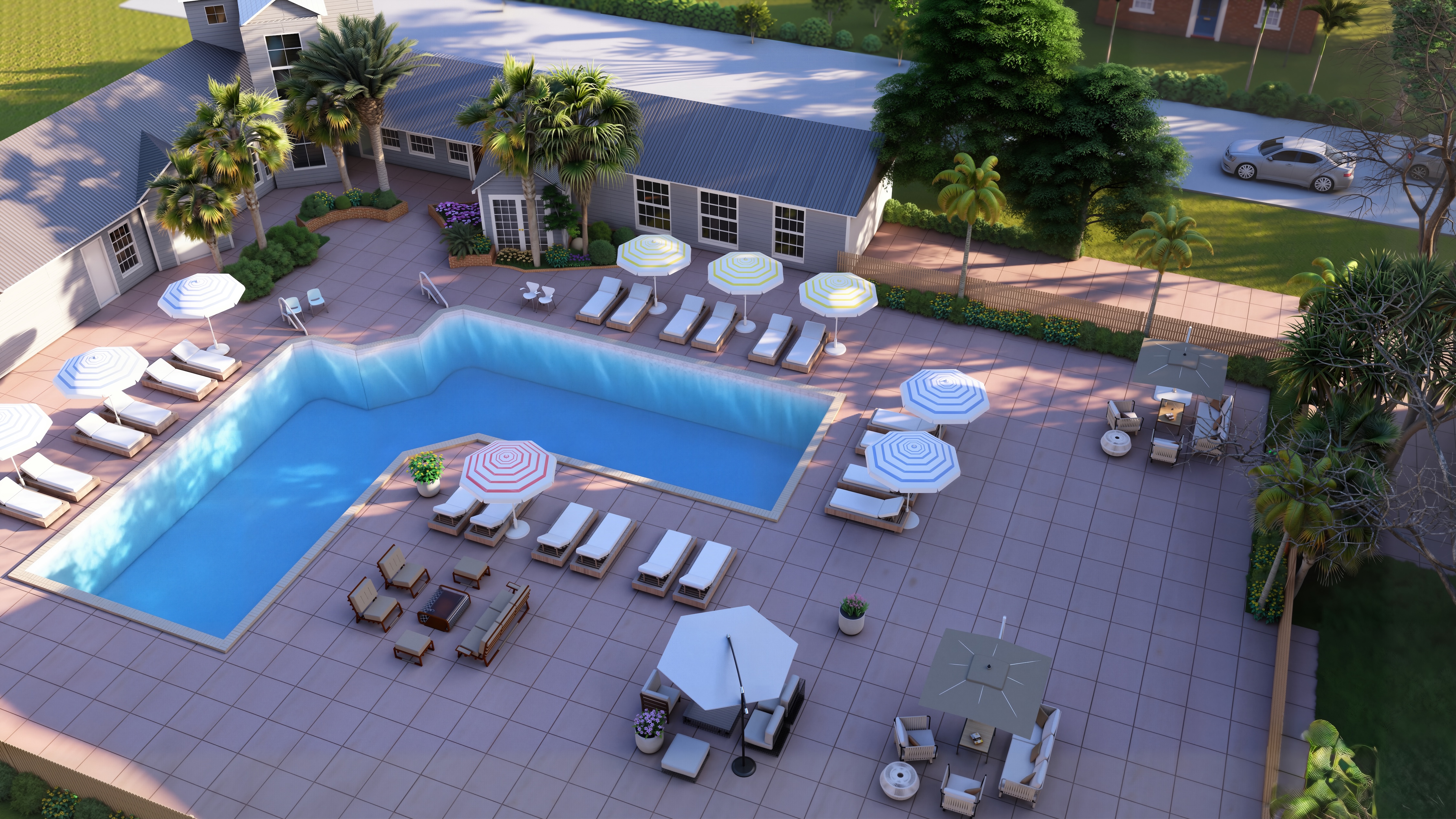 An aerial rendering of the community pool and deck area, showing multiple seating arrangements, umbrellas, and the surrounding clubhouse buildings and landscaping.