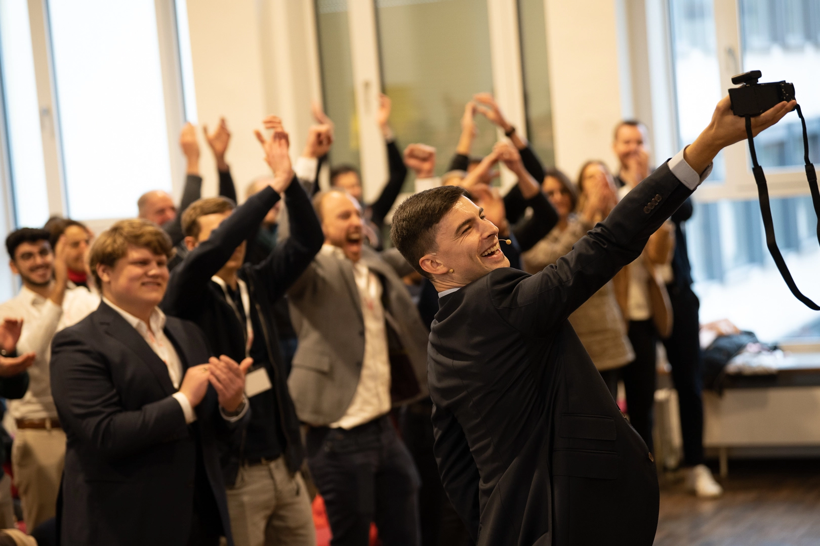 students taking selfie with mentor