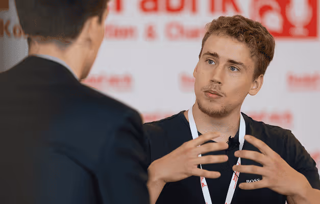 student talking with mentor