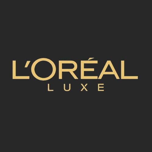 Abstract symmetrical logo with four rounded shapes forming a cross pattern on dark background.
