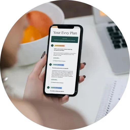 Person holding phone with health plan