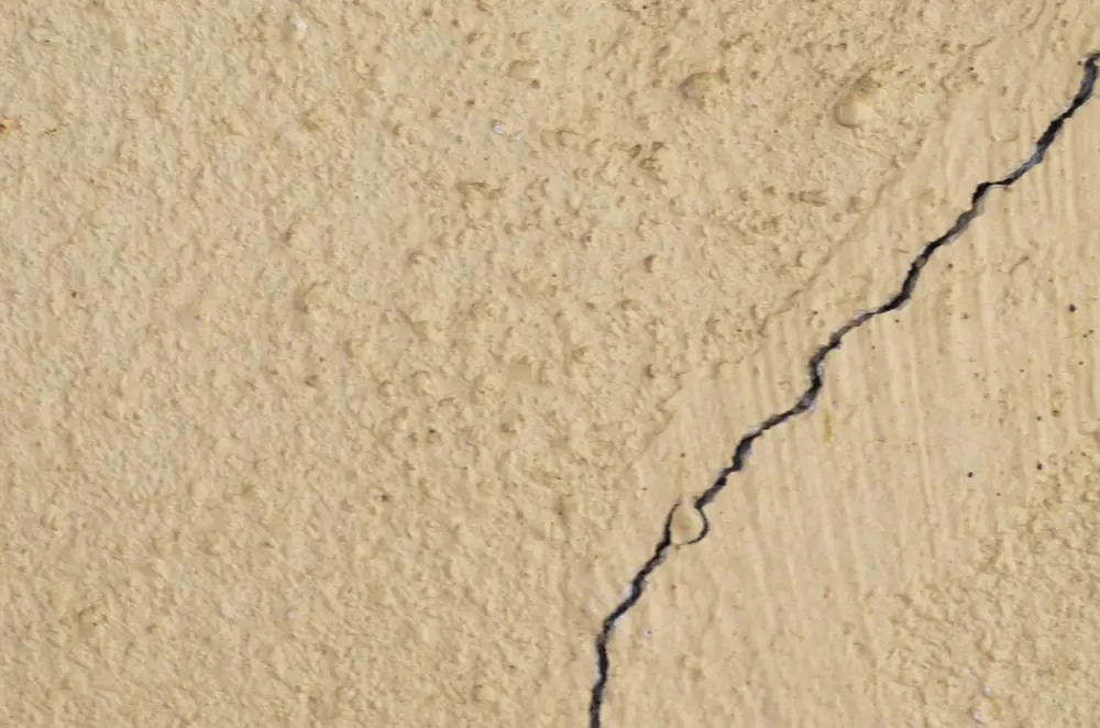 Stucco wall with a vertical crack