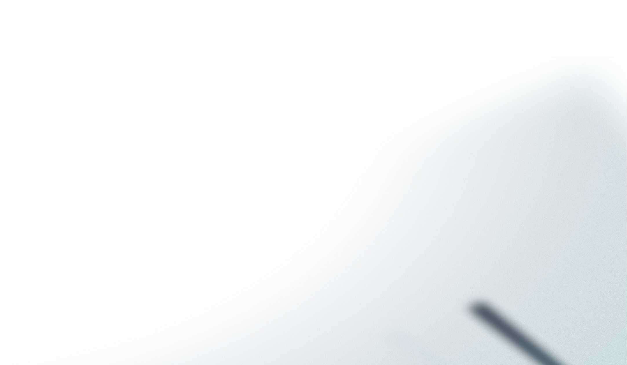 A close up of a blue object with a long shadow.