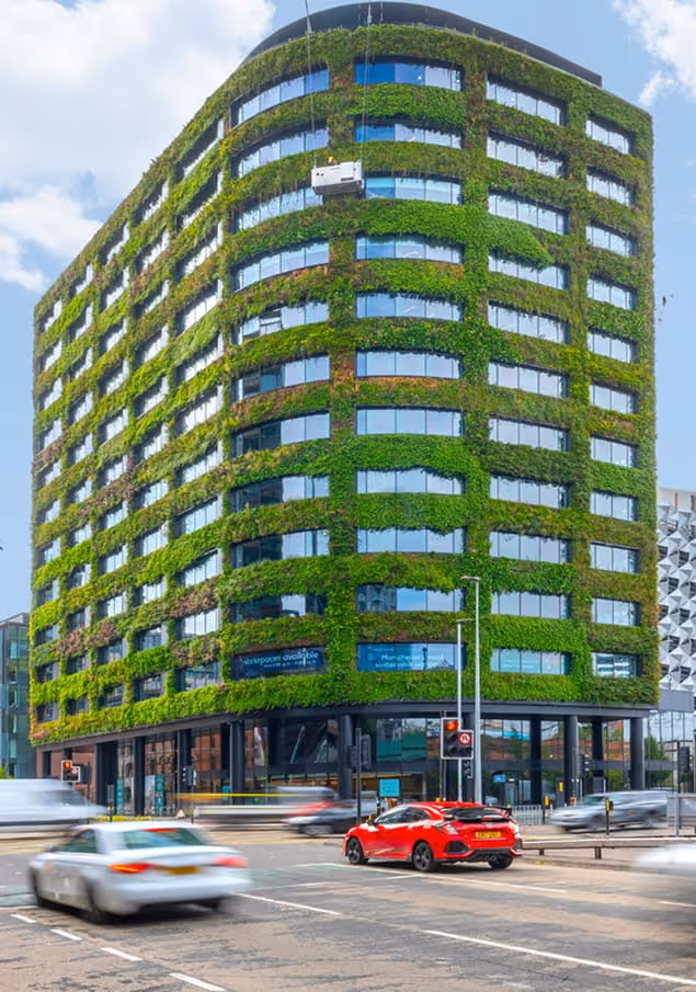 Living wall covers Eden A3 Salford with cars driving past