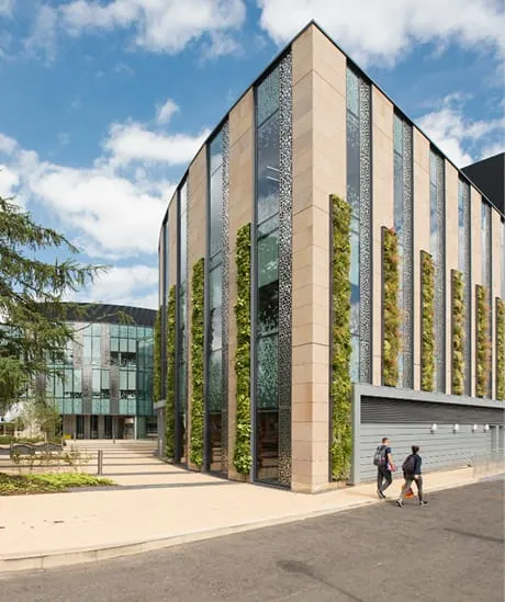University of Edinburgh building with living wall, architectural design showcasing vertical greenery