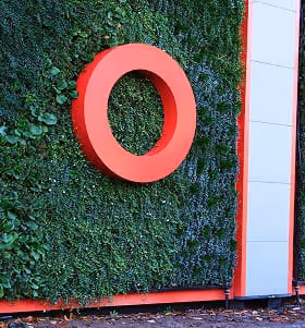 Living wall with large SEGRO logo mounted against green foliage