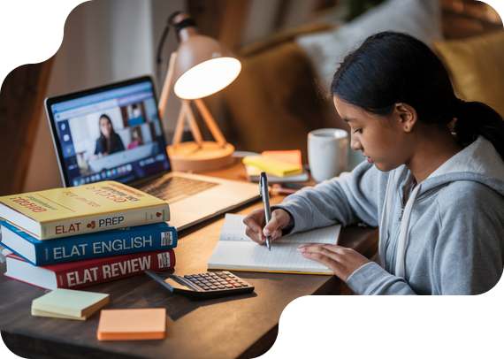Student preparing for ELAT English admissions test with prep books and online tutor