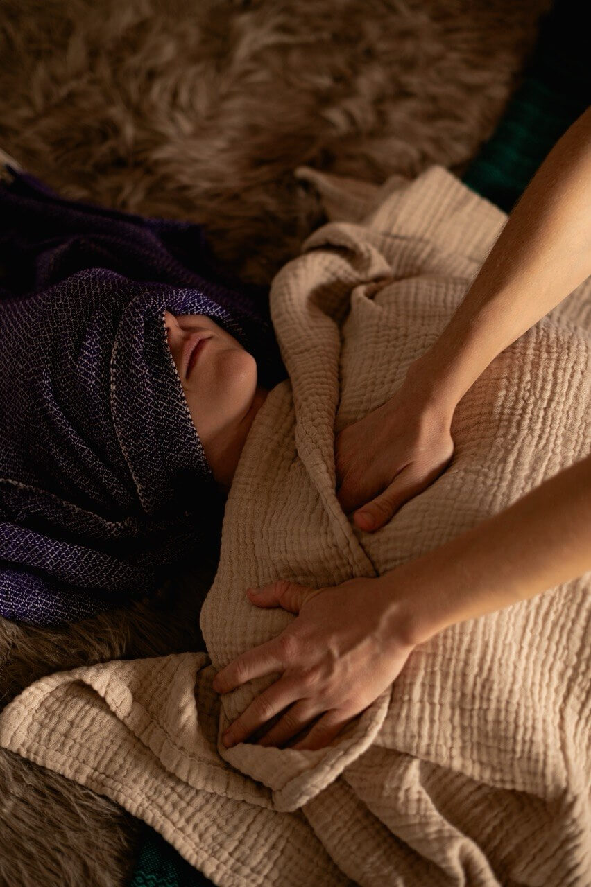 Mindful touch over a soft woven wrap